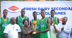 Buddo SS team recieves their basketball (boys) Wakiso district trophy