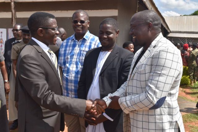 Misagga (R) welcomes Katikiro at Kiyindi landing site on Sunday