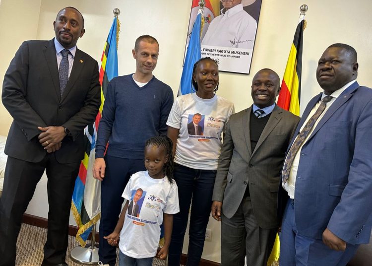 UEFA President, Aleksander Čeferin (2L) shares a photo moment with Aliguma Foundation CEO, Ritah Aliguma (M), Minister of State for Sports, Peter Ogwang (2R), NCS General Secretary, Patrick Ogwel (R) and NCS Chairman Ambrose Tashobya (L).