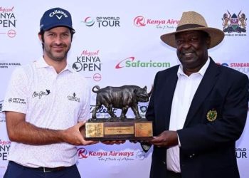 Jorge Campillo is presented with the trophy by The Prime Cabinet Secretary, Hon Musalia Mudavadi, after winning the Magical Kenya Open Presented by Absa at Muthaiga Golf Club in Nairobi. Picture: Magical Kenya Open