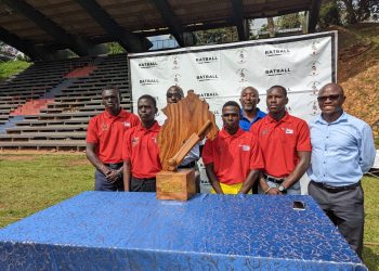 Team Captains (red) and event organizers pose for a photo moment with the Entebbe event accolade on Monday. (Photo: Uganda Cricket Association).
