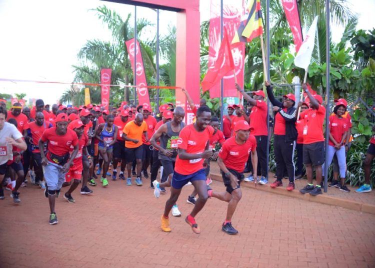 Runners being flagged off on Sunday morning at Kingdom Kampala