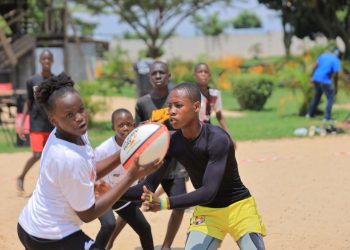 Youngsters in action at the beach touch rugby tournament.