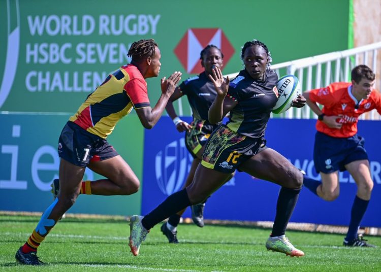 Lady Cranes Sevens Captain Peace Lekuru (with the ball) in action on Saturday.